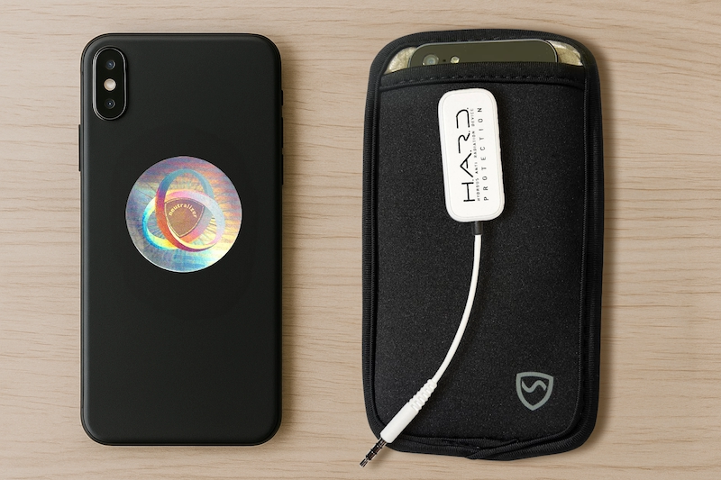 EMF Neutralizer, SYB pouch, and air tube headset on desk